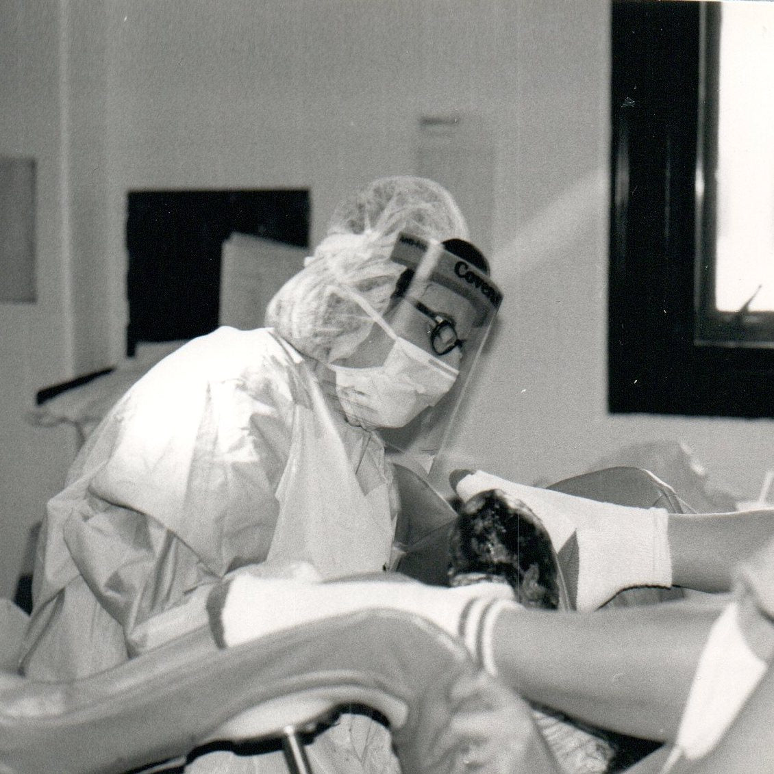 Dr. Falzon in action, delivering a baby in 1992