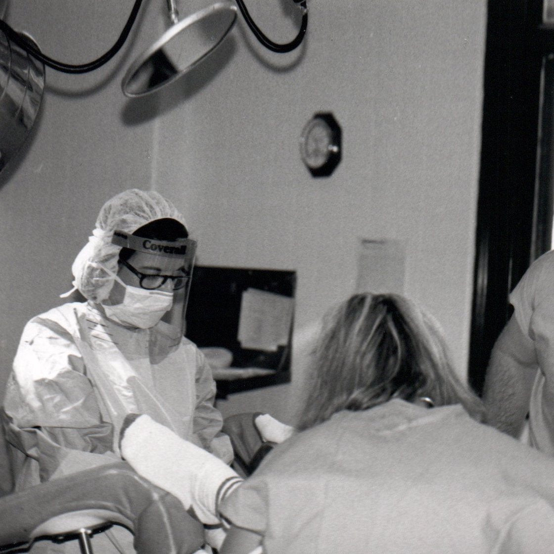 Dr. Falzon in action, delivering a baby in 1992